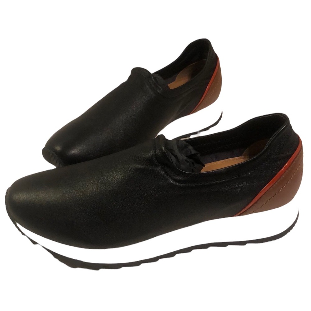 AQUATALIA Women's Daelyn Weatherproof Slip-On Sneaker Black/Amber/Tanger US 10